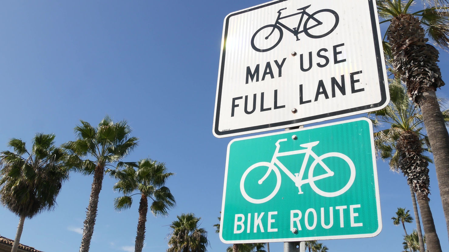 Follow bike routes and stay in bike lanes.  Rules of road California